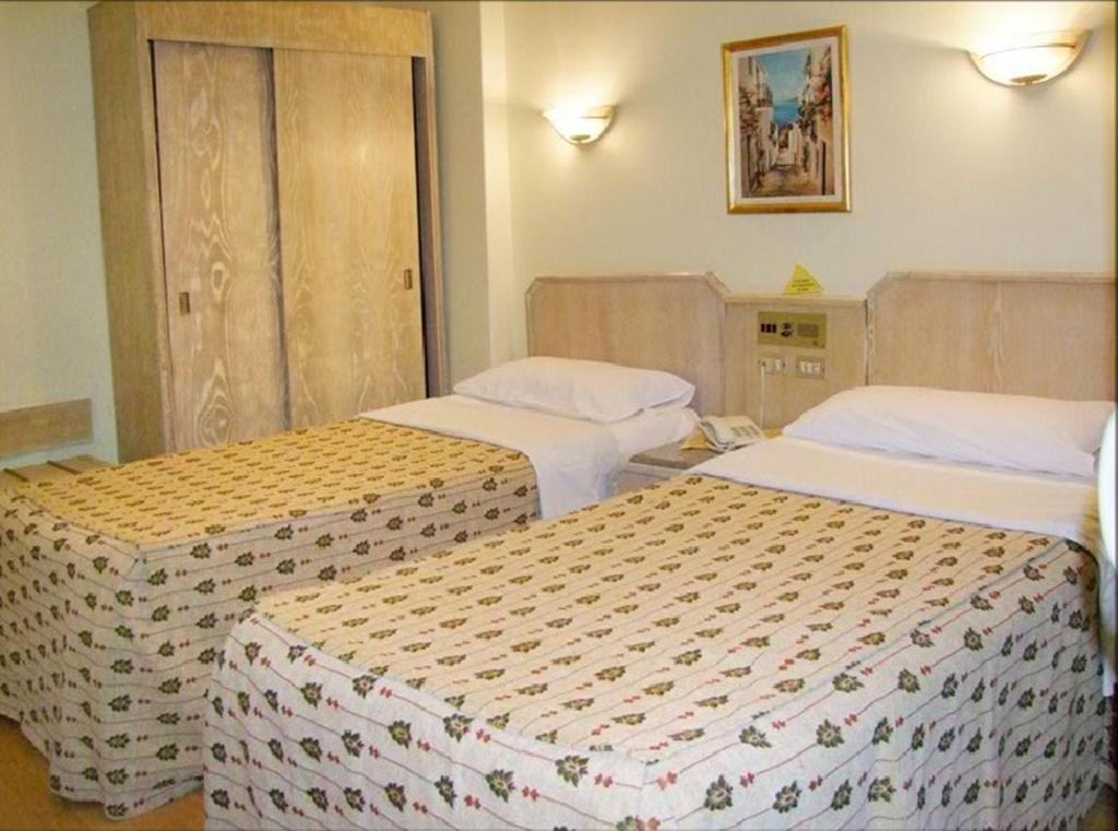 Emilio Hotel Luxor Szoba fotó